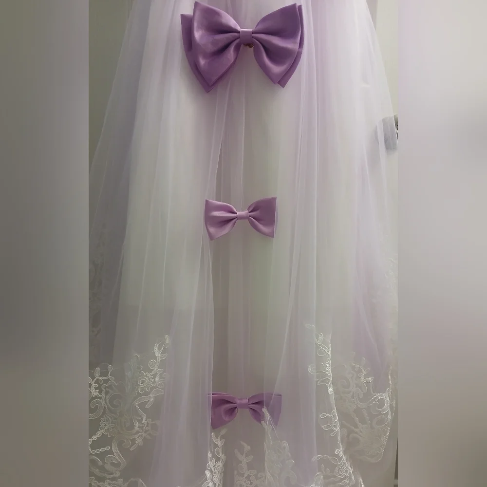 Elegant White and Purple Dress with Bows At Back And Down Length Of Dress.